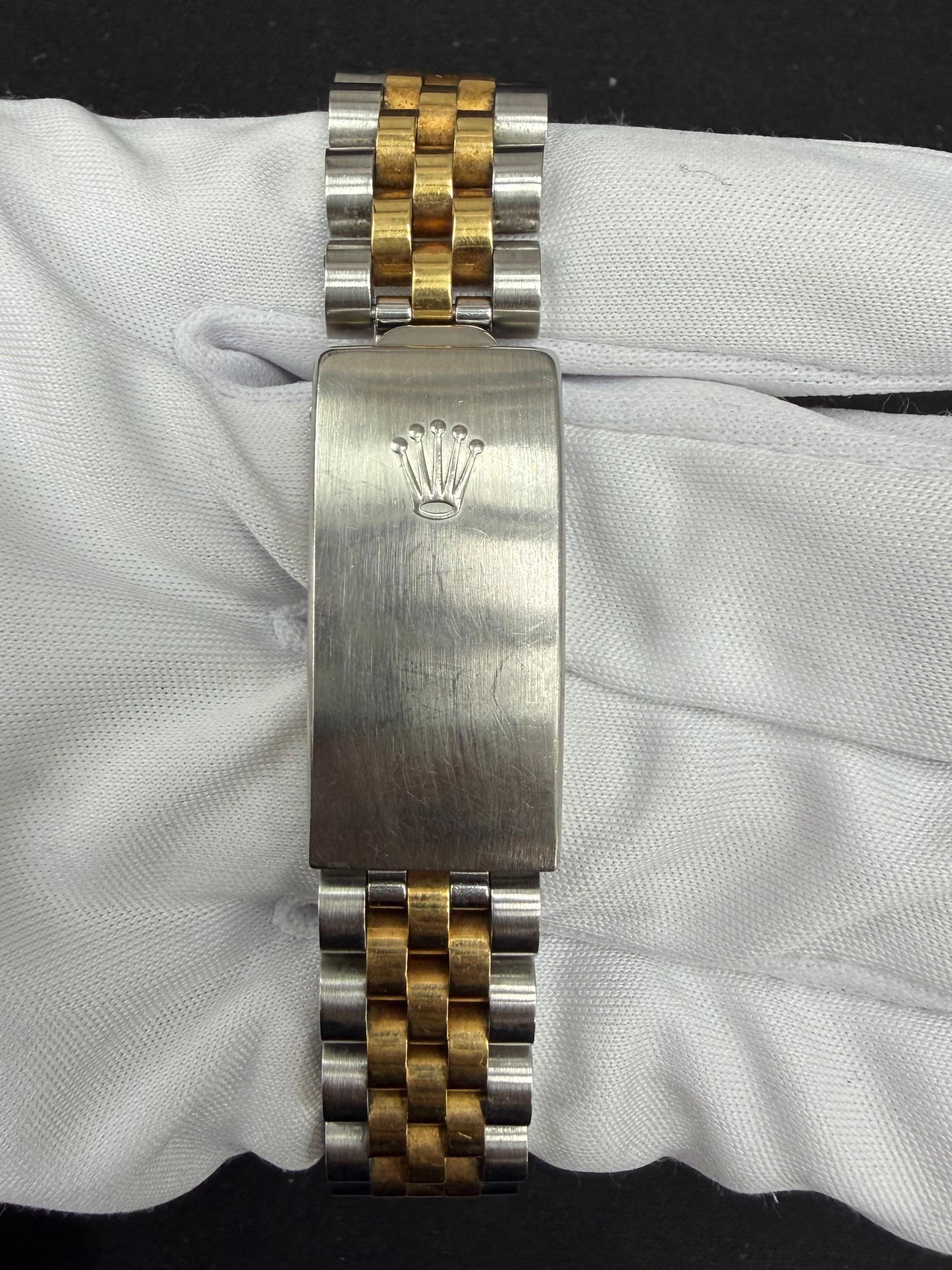 Rolex Datejust 31mm Two-Tone 18K Yellow Gold & Steel White Roman Dial Ref. 68273