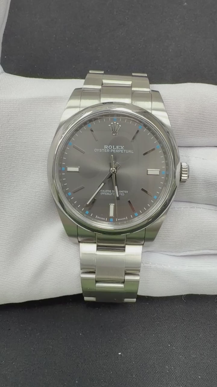 Rolex Oyster Perpetual 39mm Stainless Steel Rhodium Dial Ref. 114300